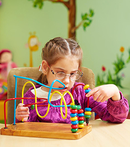 Student plays with a toy