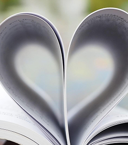 Book pages forming a heart