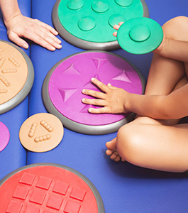 Students play with disks in class